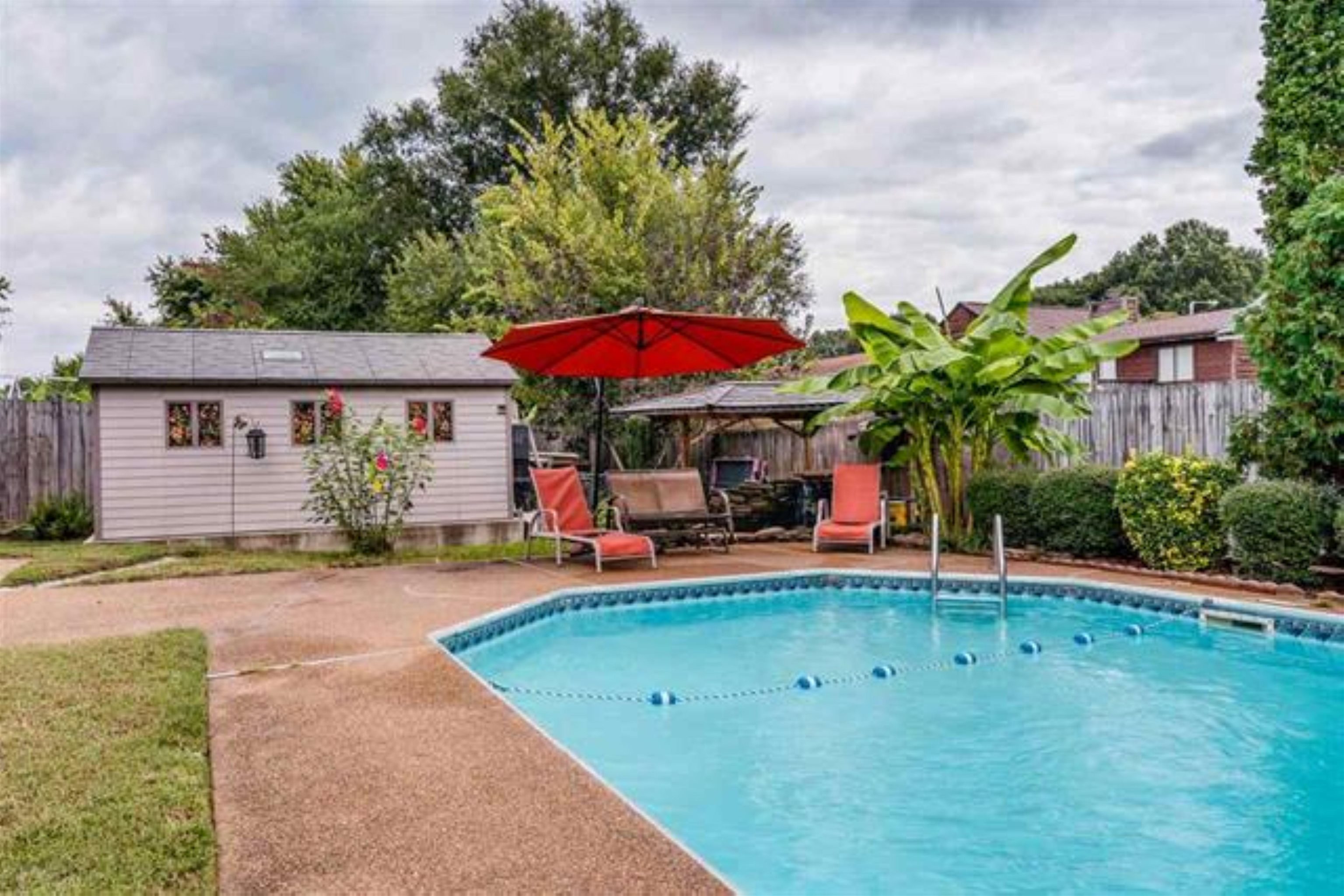 4182 Luther Road Bartlett, TN 38135 - Photo 24 of 40 a view of a house with backyard porch and sitting area