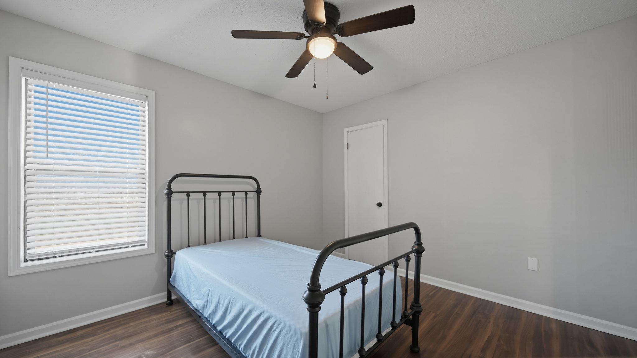4182 Luther Road Bartlett, TN 38135 - Photo 40 of 40 a view of a hallway with a bedroom