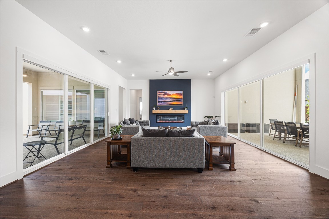 4114 Pleasant Ridge Drive Spring, TX 77386 - Photo 14 of 48 Open-concept living room designed for effortless flow, seamlessly connecting to the kitchen for both everyday living and easy entertaining.