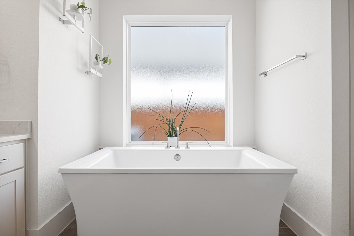 4114 Pleasant Ridge Drive Spring, TX 77386 - Photo 22 of 48 Oversized tub in the primary bathroom.