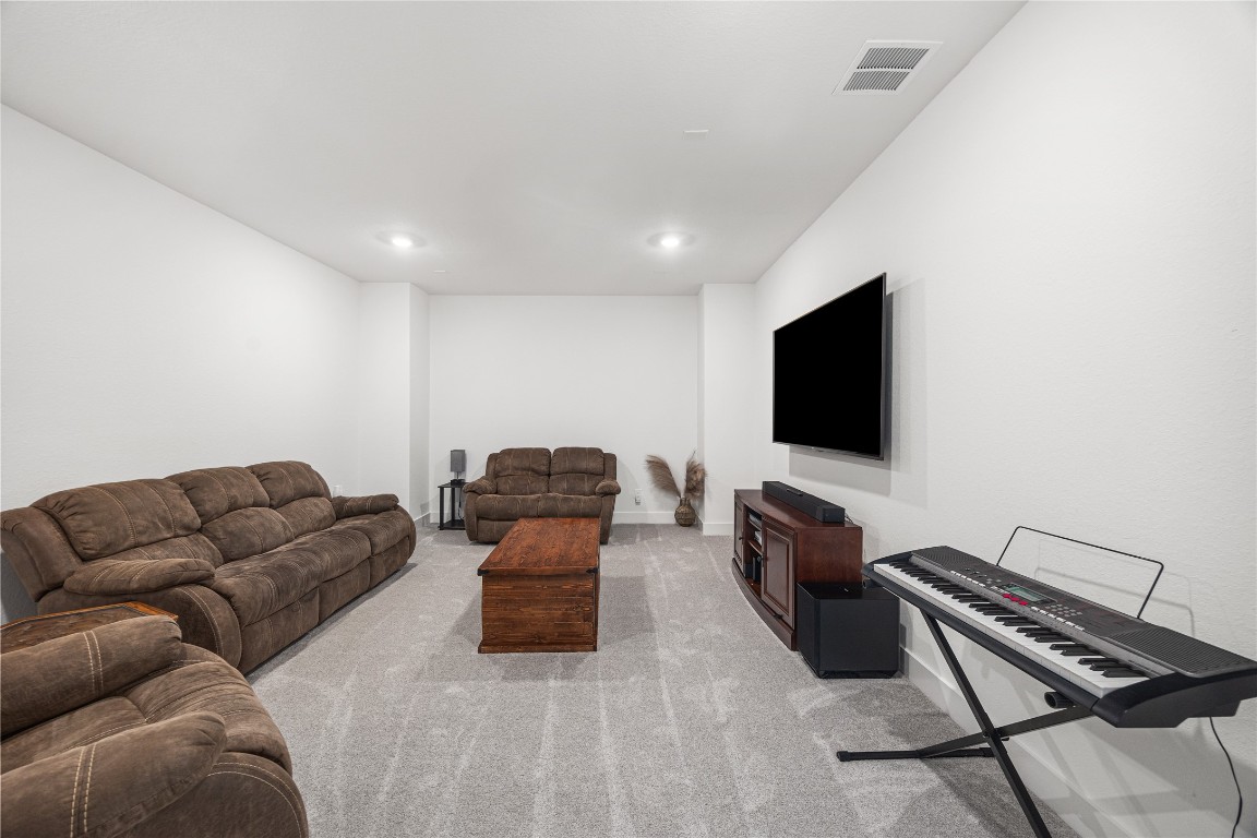 4114 Pleasant Ridge Drive Spring, TX 77386 - Photo 31 of 48 Versatile media room designed to adapt to your family’s lifestyle—perfect for movie nights, gaming, or creating your own private retreat.