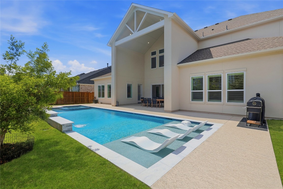 4114 Pleasant Ridge Drive Spring, TX 77386 - Photo 38 of 48 Sports pool with tanning ledge.