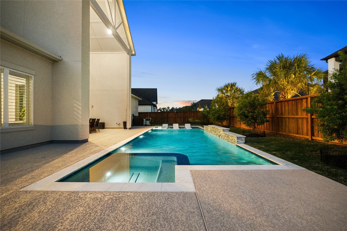 4114 Pleasant Ridge Drive Spring, TX 77386 - Photo 41 of 48 Fully heated pool with a spa chiller ensures year-round enjoyment, so you can relax and entertain in every season.