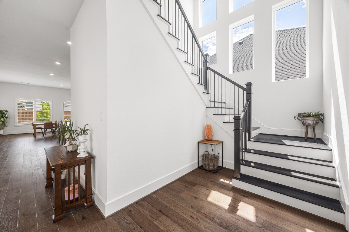 4114 Pleasant Ridge Drive Spring, TX 77386 - Photo 7 of 48 Wood flooring on the stairs and gorgeous windows with plenty of natural light.