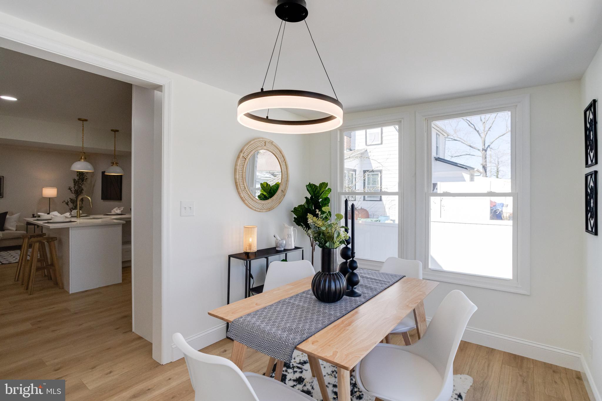 1729 Winans Avenue Halethorpe, MD 21227 - Photo 12 of 40 a view of a dining room with furniture window and wooden floor