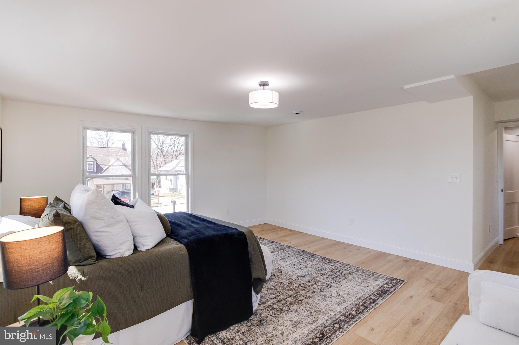 1729 Winans Avenue Halethorpe, MD 21227 - Photo 18 of 40 a living room with furniture and a window