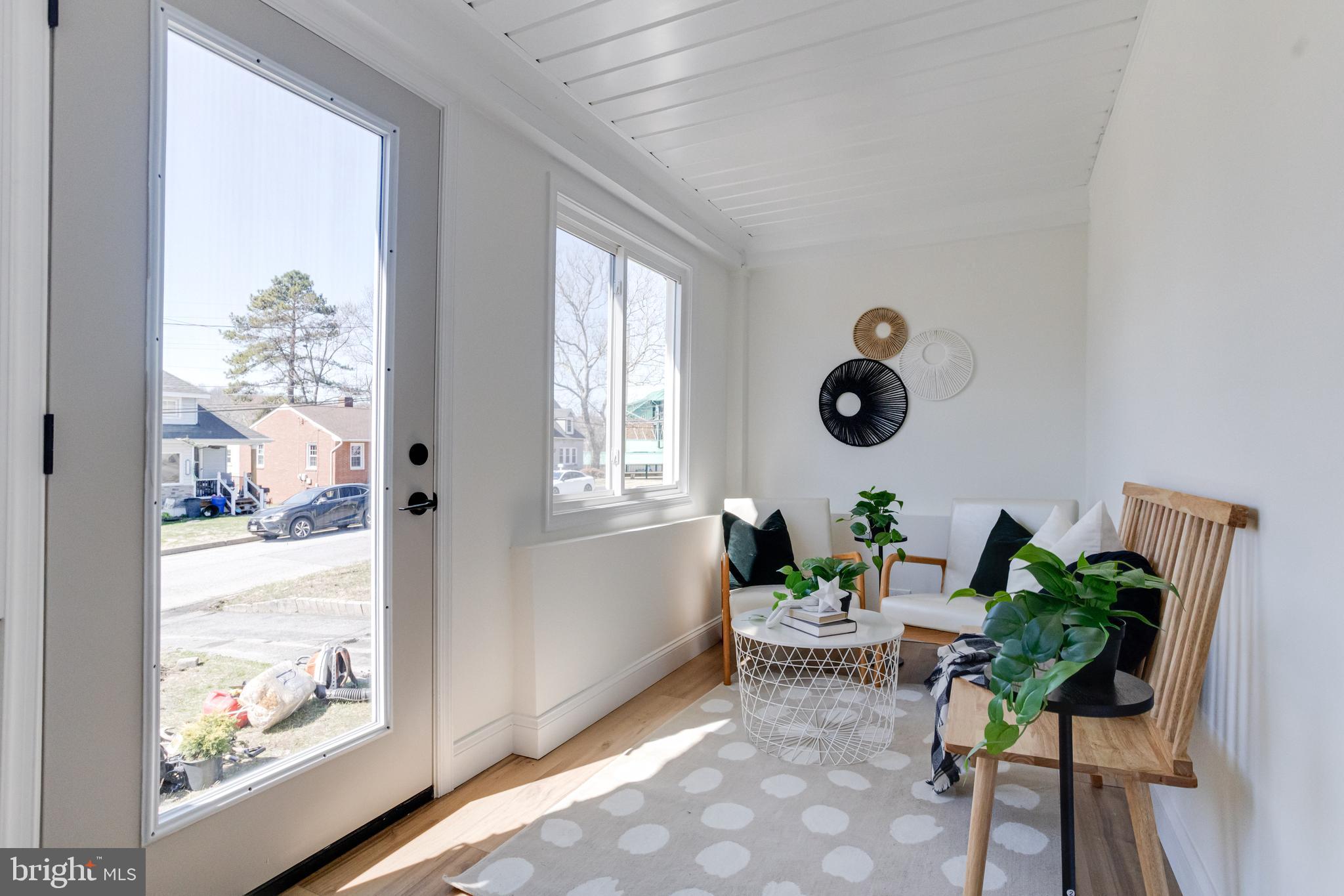 1729 Winans Avenue Halethorpe, MD 21227 - Photo 2 of 40 a living room with furniture and a window