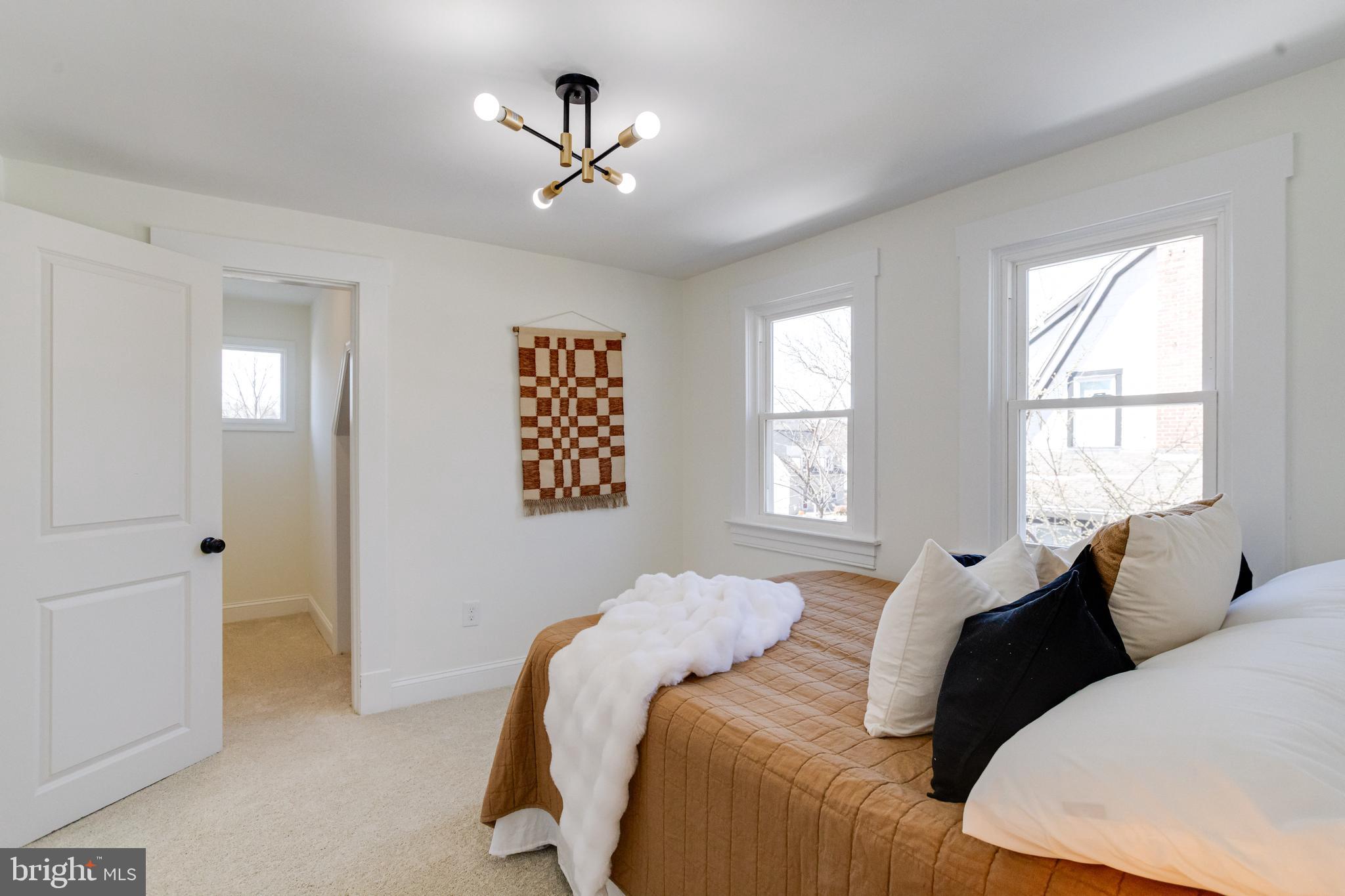 1729 Winans Avenue Halethorpe, MD 21227 - Photo 25 of 40 a bedroom with a bed and window