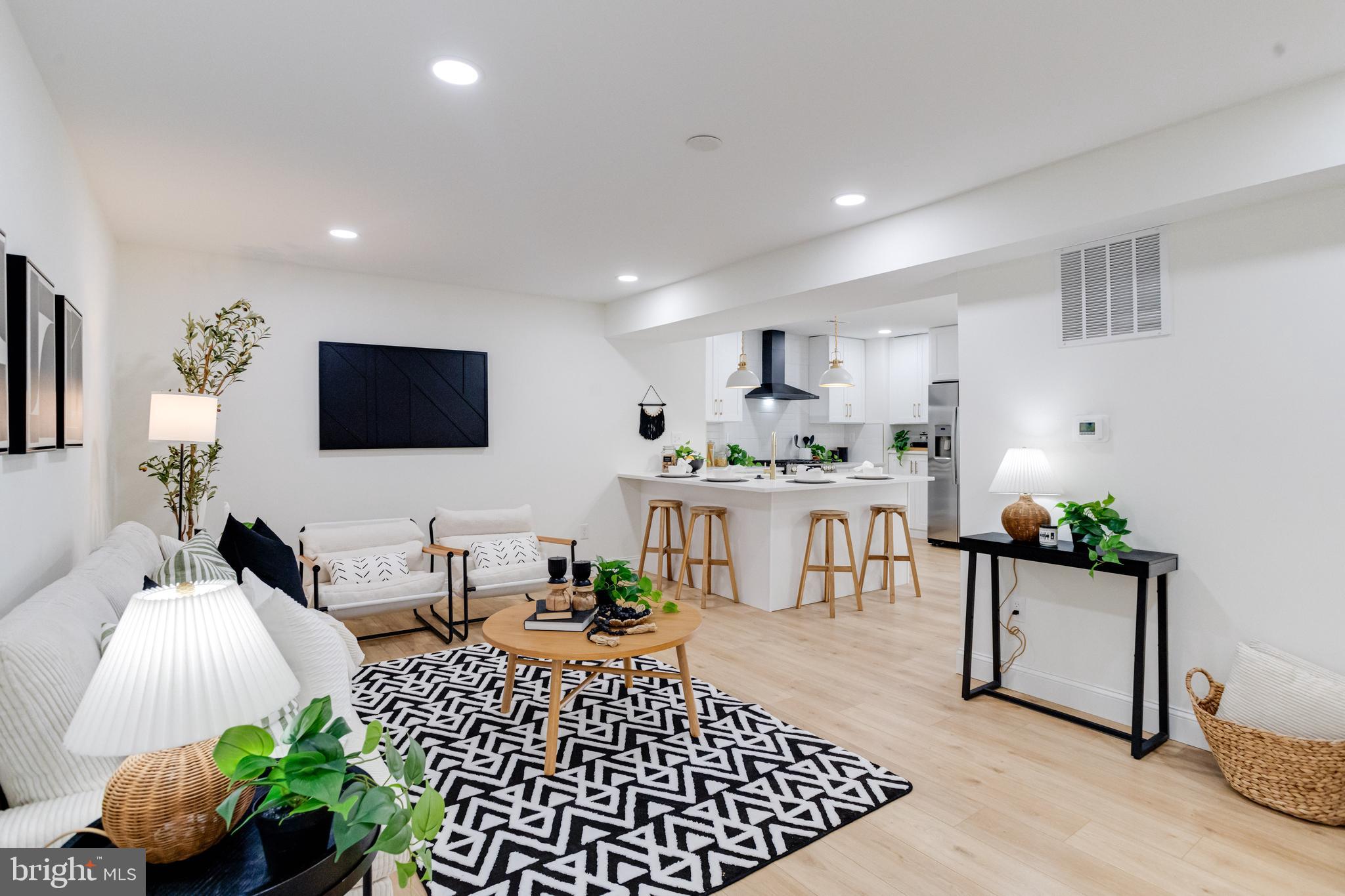 1729 Winans Avenue Halethorpe, MD 21227 - Photo 3 of 40 a living room with furniture and a flat screen tv