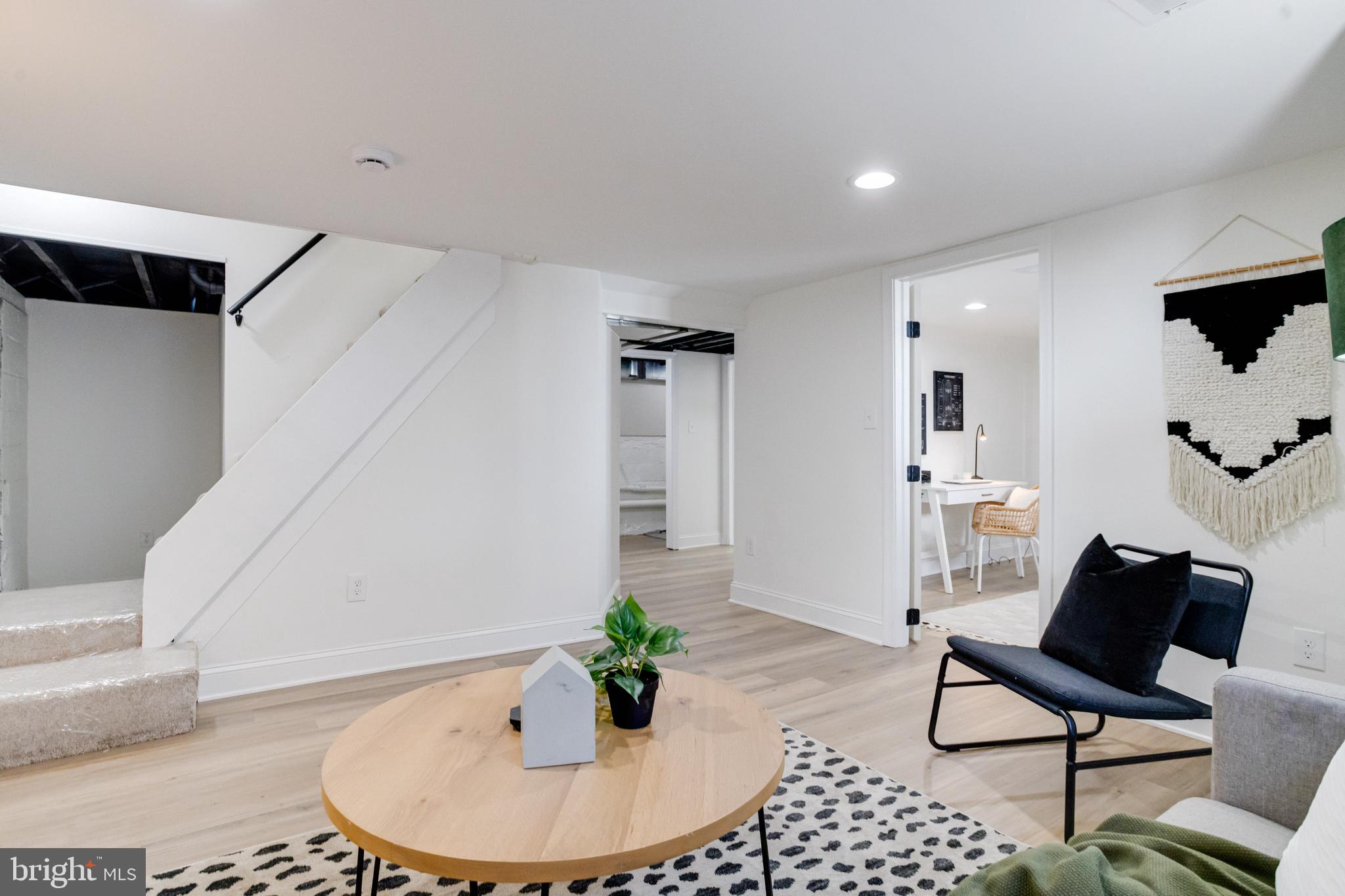 1729 Winans Avenue Halethorpe, MD 21227 - Photo 34 of 40 a living room with furniture and a potted plant