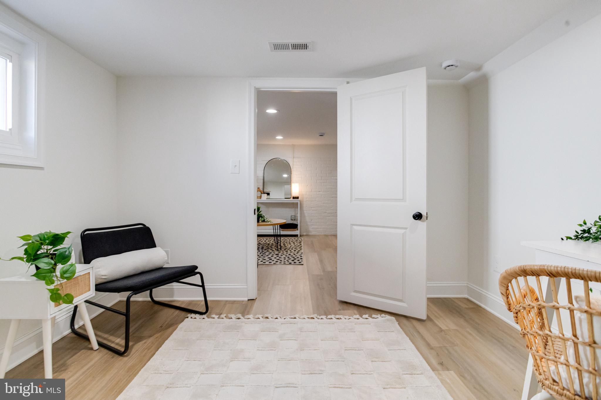 1729 Winans Avenue Halethorpe, MD 21227 - Photo 36 of 40 a living room with furniture and a wooden floor