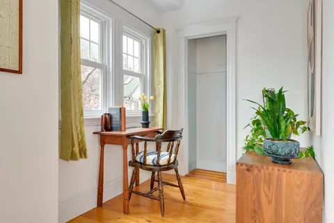 a kitchen with sink and cabinets