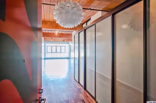 a view of entryway with wooden floor