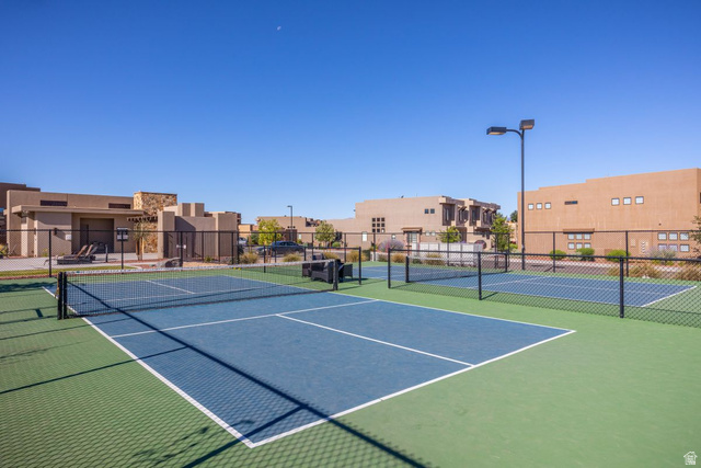 4845 Fishers Is Way St. George, UT 84770 - Photo 36 of 41 View of tennis court with community basketball court and a residential view