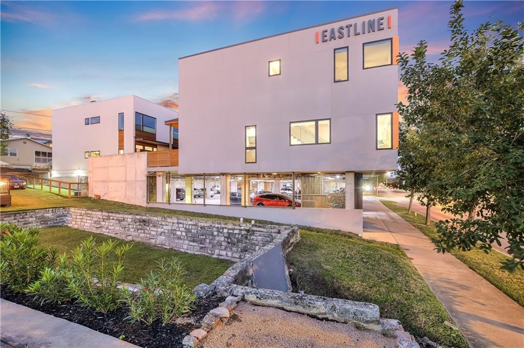 2002 East 7th Street, Unit 212 Austin, TX 78702 - Photo 16 of 23 a view of a house with a yard