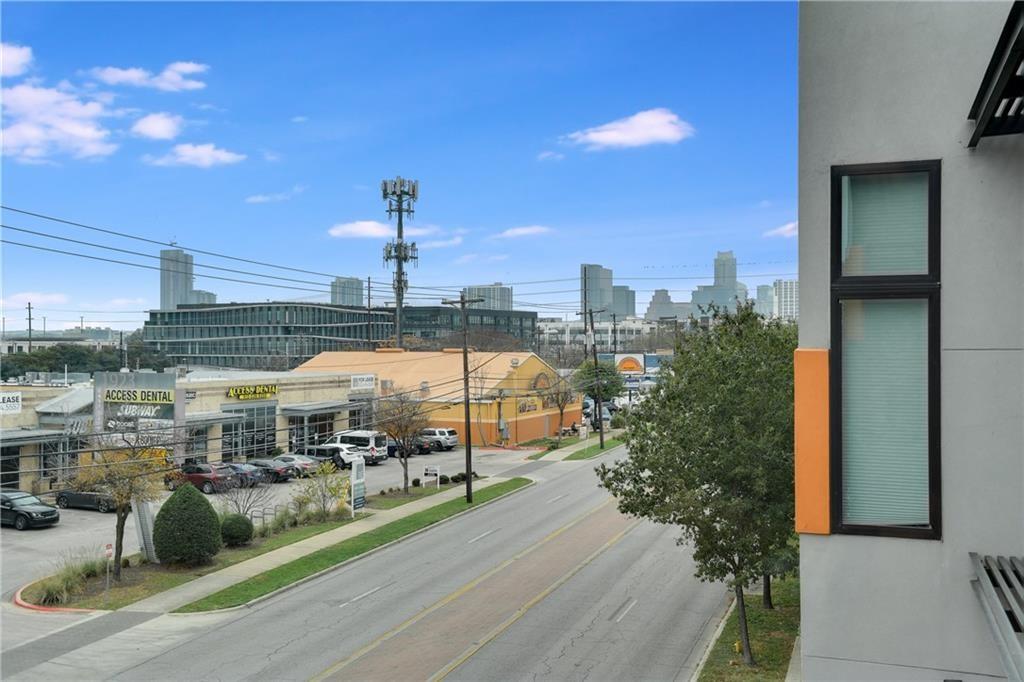 2002 East 7th Street, Unit 212 Austin, TX 78702 - Photo 17 of 23 a view of a city from a balcony