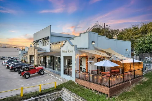 a view of a cars park in front of house