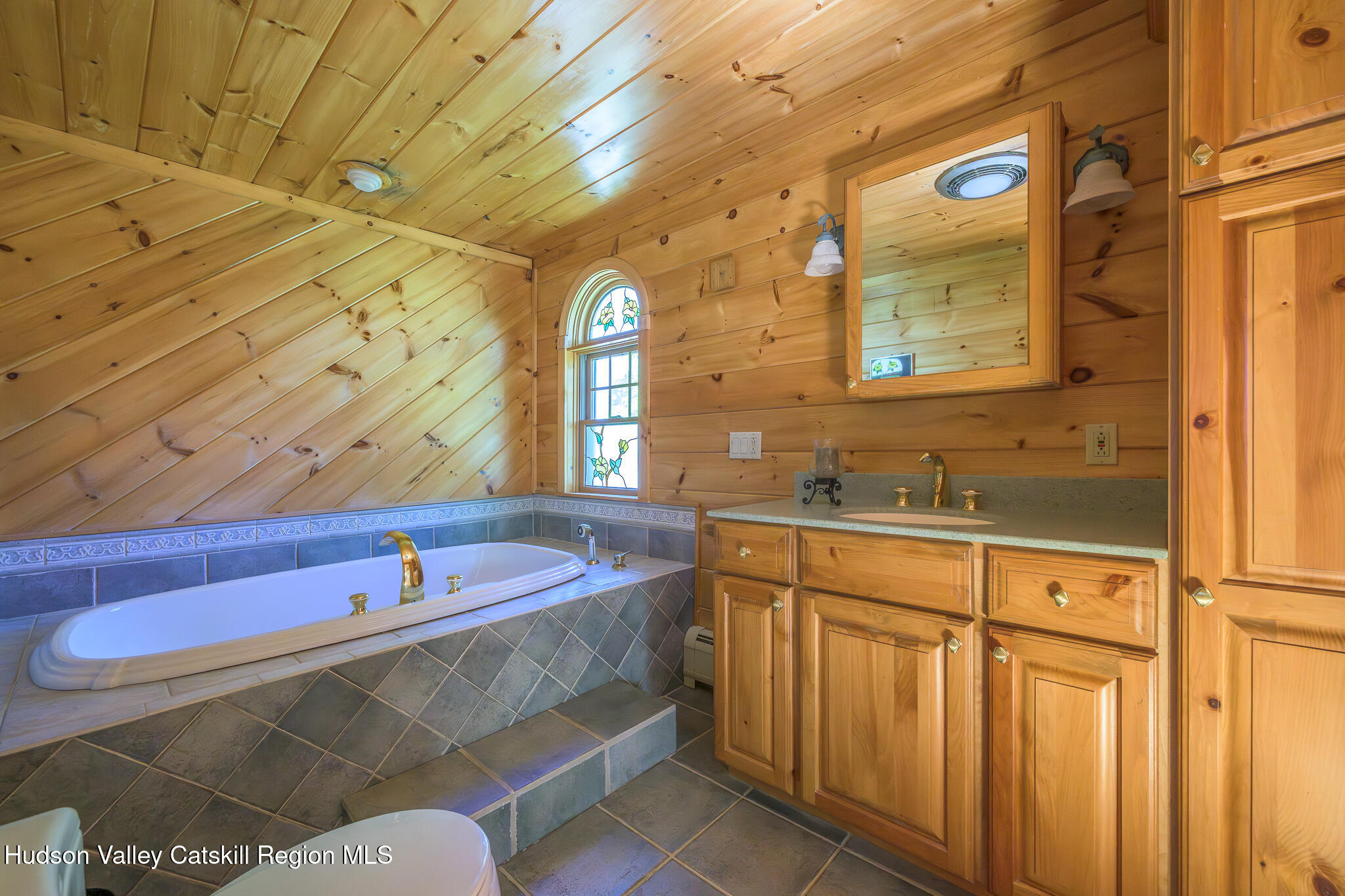 34 Queechy Shore Beach Road Canaan, NY 12029 - Photo 19 of 31 a bathroom with a sink and a bathtub