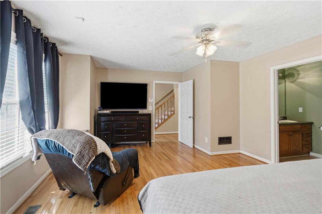 7540 County Line Road Lula, GA 30554 - Photo 13 of 62 a living room with furniture and a flat screen tv
