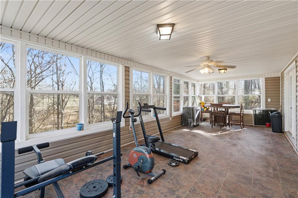 7540 County Line Road Lula, GA 30554 - Photo 40 of 62 a view of a room with gym equipment