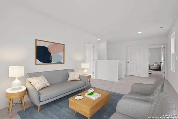 a living room with furniture and a couch