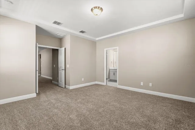 a bathroom with a double vanity sink mirror and shower