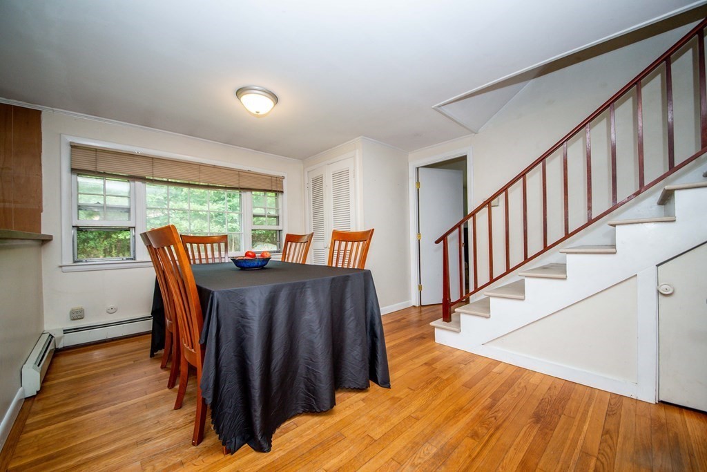 526 Delano Road Marion, MA 02738 - Photo 15 of 24 a view of a dining room with furniture window and wooden floor