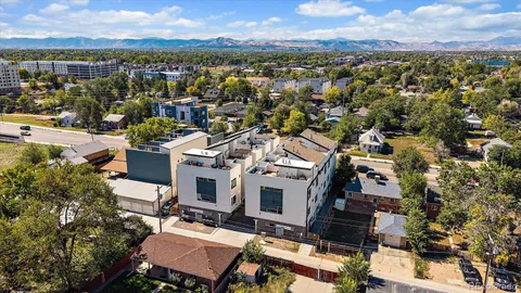 an aerial view of residential house with an outdoor space