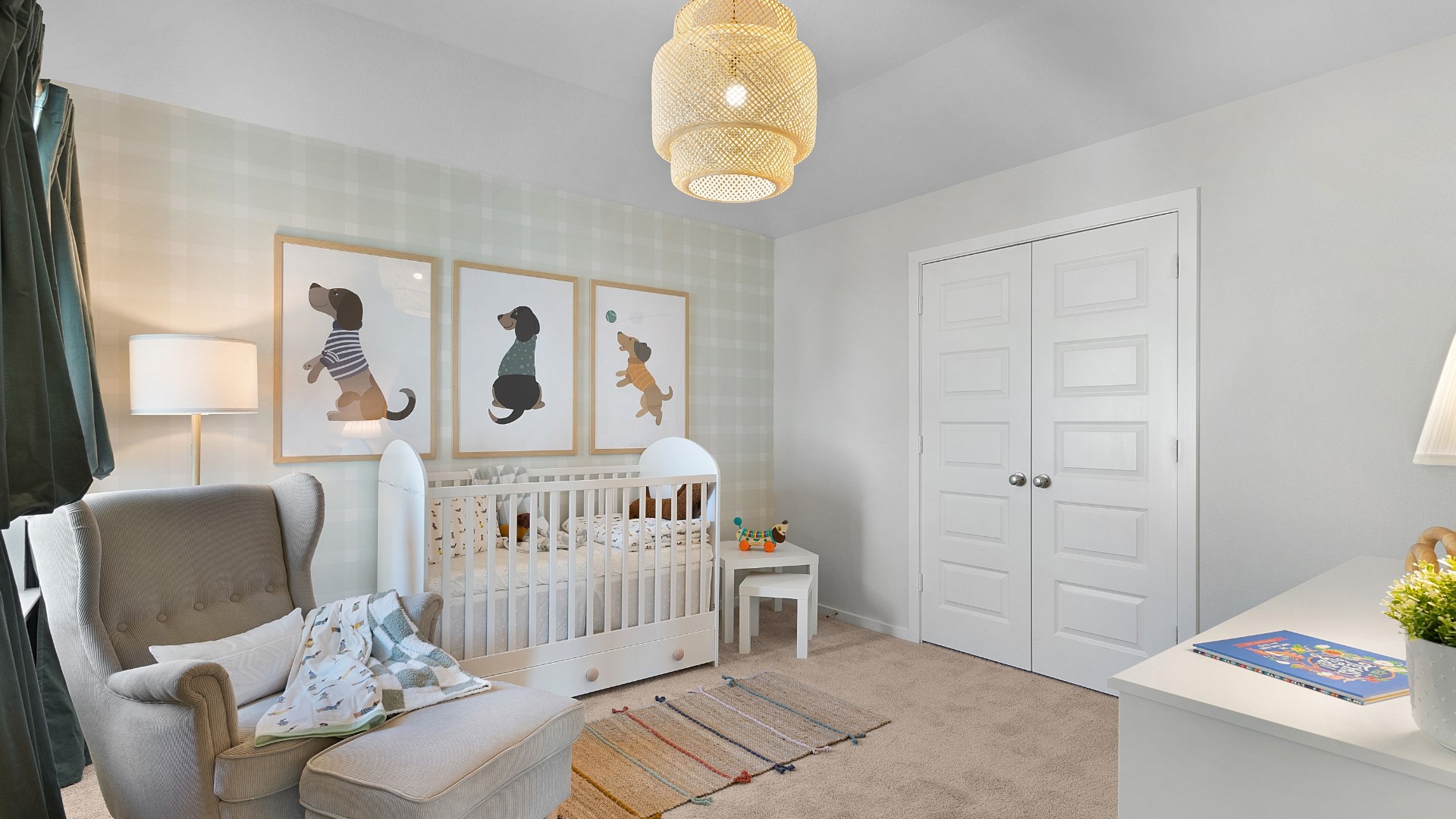 25812 Jasmine Sprig Lane Elgin, TX 78621 - Photo 21 of 33 A comforting nursery with soft carpeting, featuring a cozy armchair and crib.