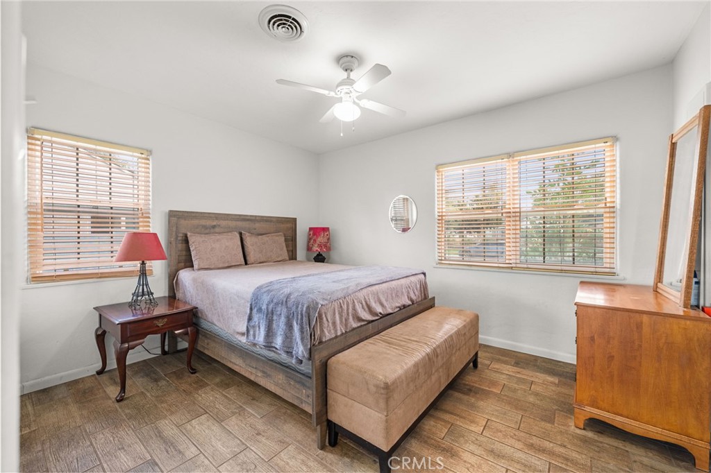 3620 Hoover Street Riverside, CA 92504 - Photo 12 of 44 a bedroom with a bed and window