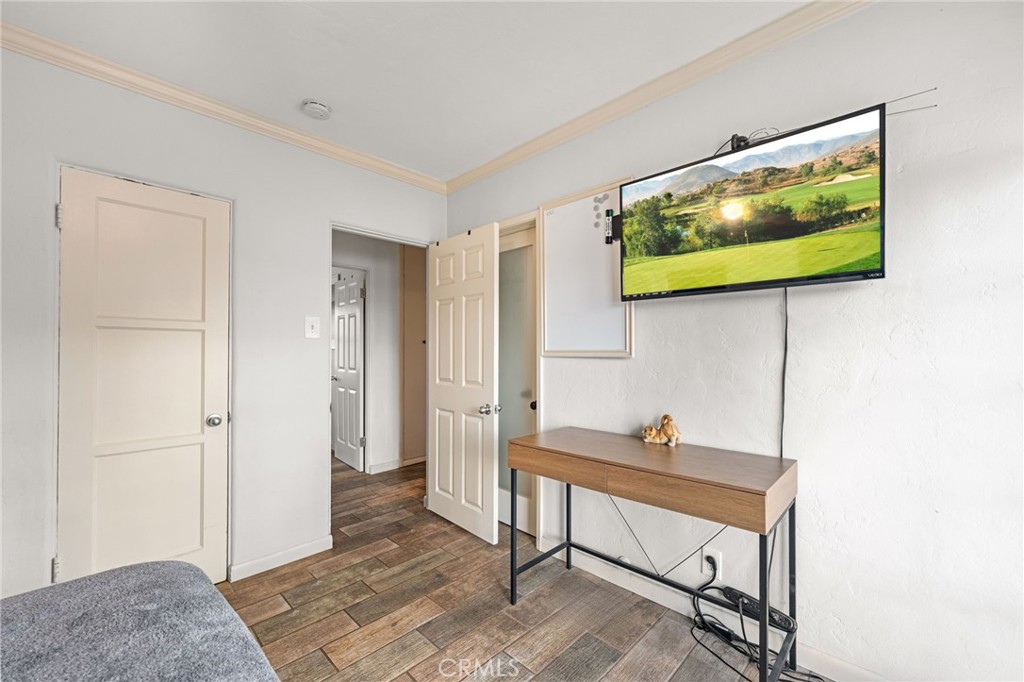 3620 Hoover Street Riverside, CA 92504 - Photo 14 of 44 a living room with furniture and a flat screen tv