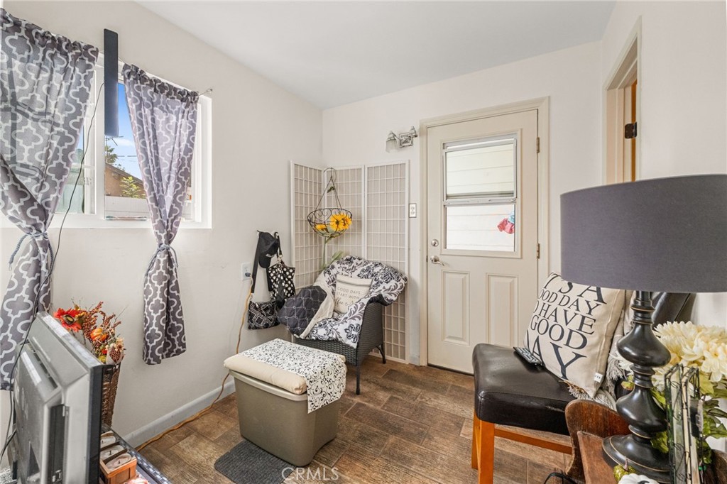 3620 Hoover Street Riverside, CA 92504 - Photo 22 of 44 a living room with furniture and a flat screen tv