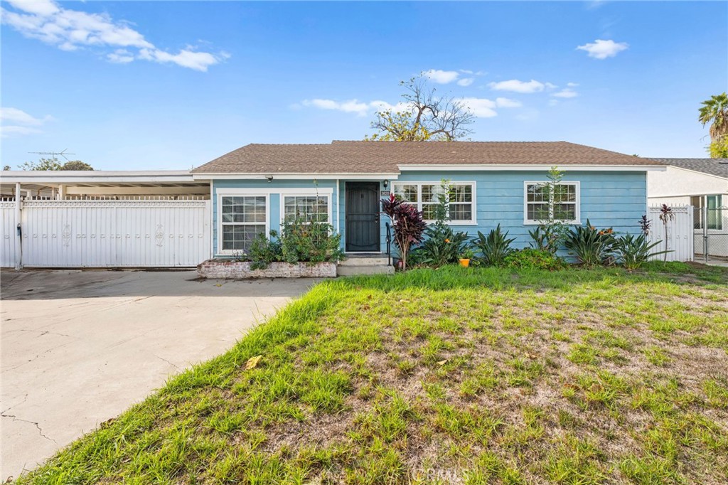 3620 Hoover Street Riverside, CA 92504 - Photo 42 of 44 a front view of a house with garden