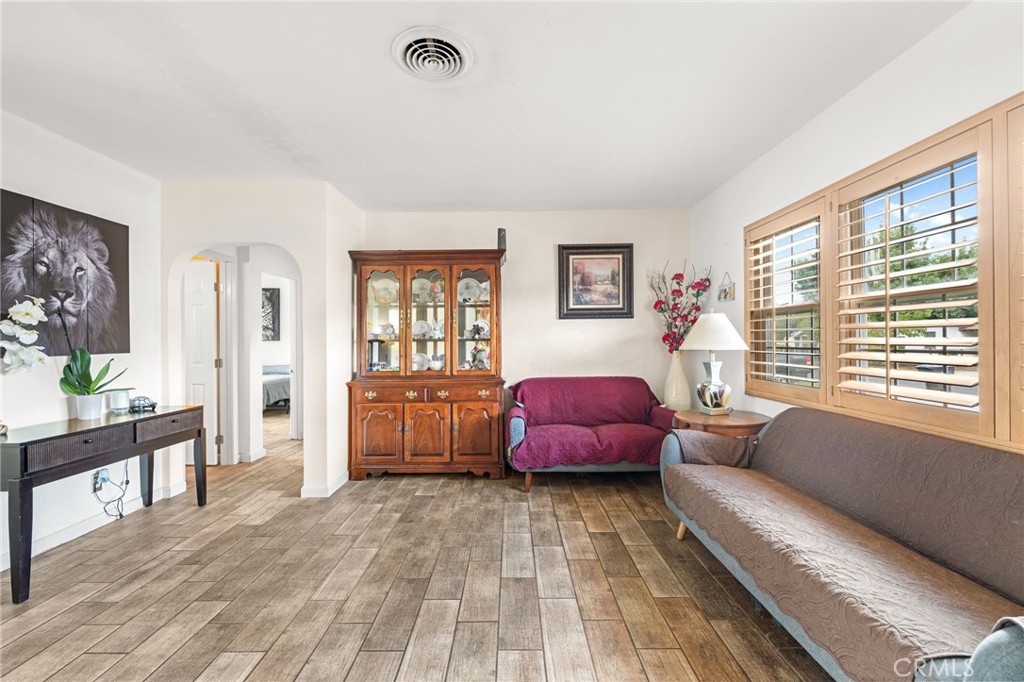 3620 Hoover Street Riverside, CA 92504 - Photo 8 of 44 a bedroom with a bed and a couch