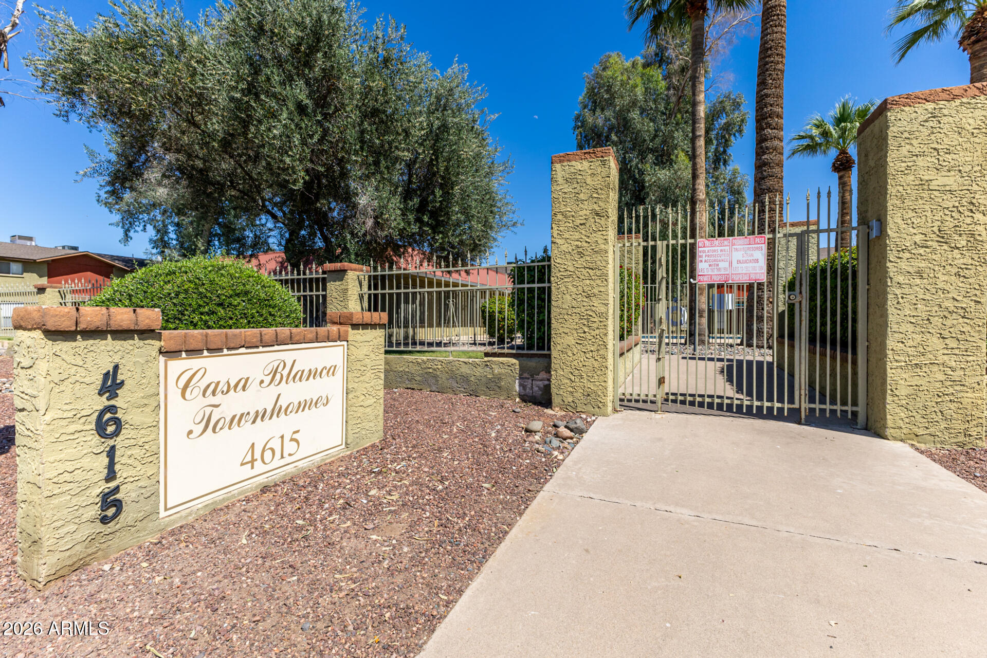 4615 North 39th Avenue, Unit 23 Phoenix, AZ 85019 - Photo 15 of 15 a view of a sign board with buildings