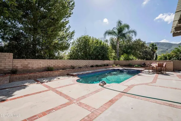 a view of yard with outdoor seating