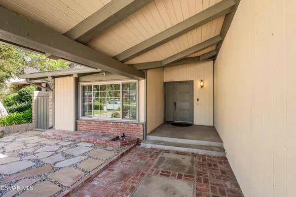 a view of a backyard of a house