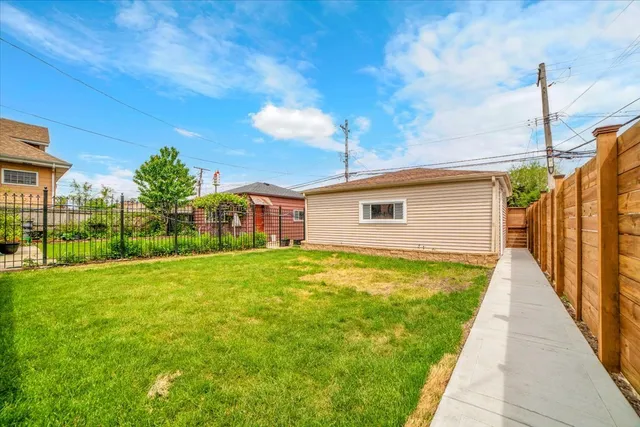 a front view of a house with yard