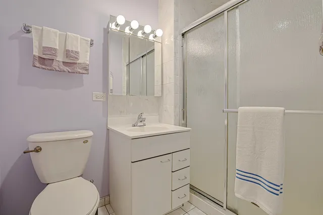 a view of a workspace with furniture and gym equipment