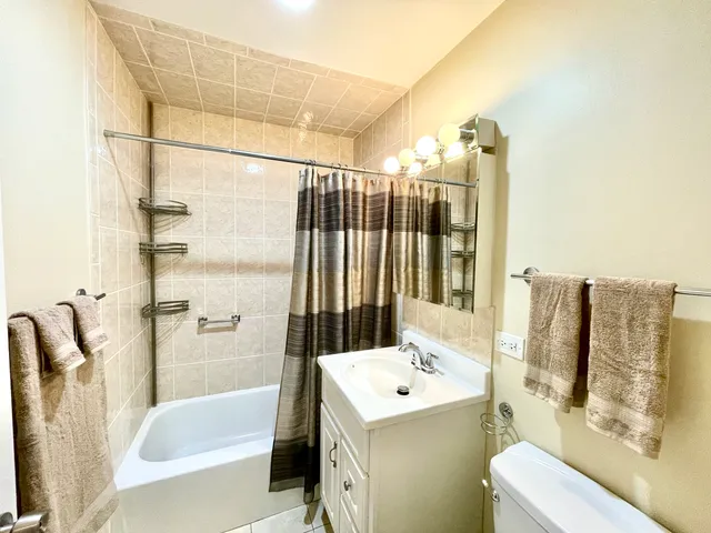 a view of living room with furniture and window