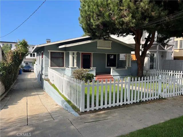 a front view of house yard and front view of a house