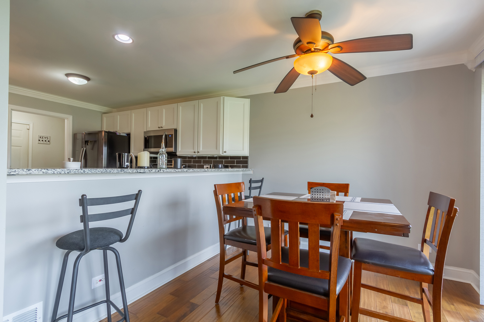 10909 Cape Cod Lane Huntley, IL 60142 - Photo 6 of 18 a dining room with furniture and window