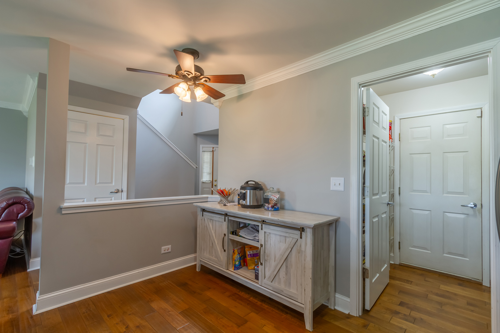 10909 Cape Cod Lane Huntley, IL 60142 - Photo 8 of 18 a hallway with cabinets