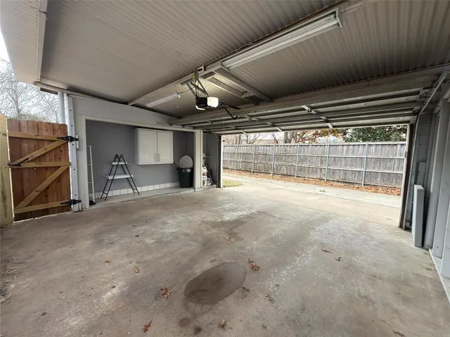 a view of backyard with garage