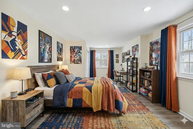 a bed room with bed and a window