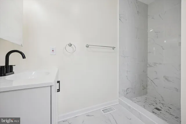 a close view of a shower in bathroom