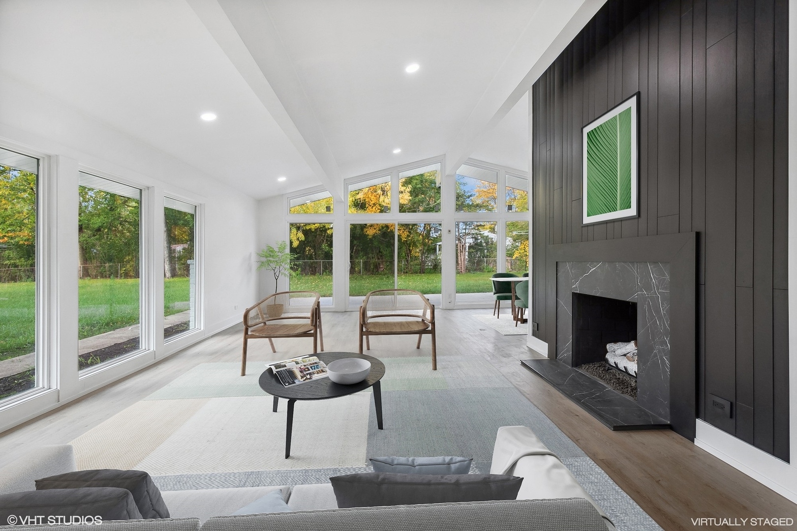 3131 Willow Road Northbrook, IL 60062 - Photo 4 of 23 a living room with furniture and a fireplace