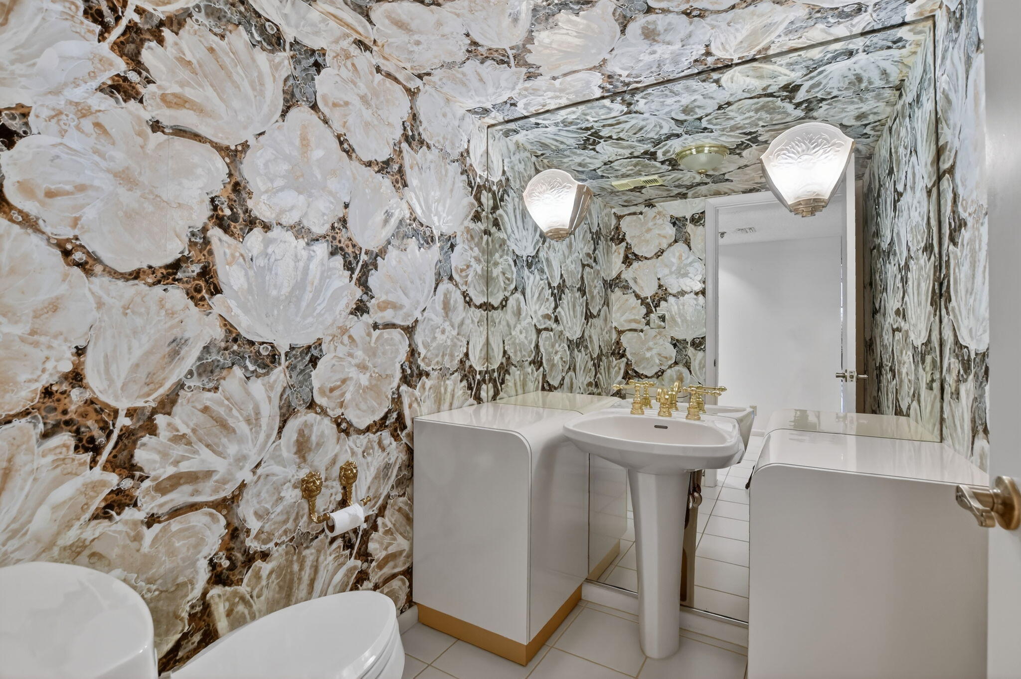 7564 Regency Lake Drive, Unit 701 Boca Raton, FL 33433 - Photo 41 of 47 a bathroom with a sink toilet and shower