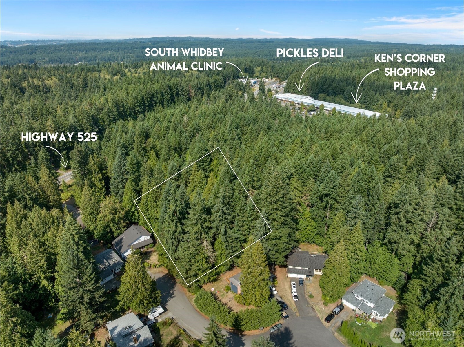 4105 Tartan Way Clinton, WA 98236 - Photo 2 of 18 a view of a field with an ocean view