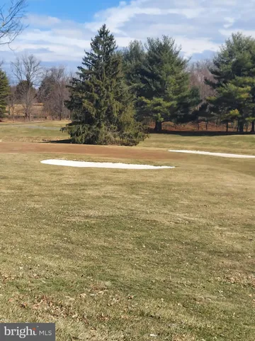 a view of an ocean and mountain